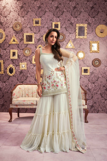 Women Floral Embroidered Regular Sequinned Kurti with Sharara & With Dupatta